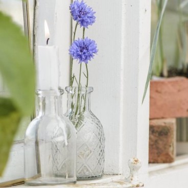 Flaske til bedelys med blomster - Ib Laursen