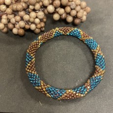 Nepali armbånd blå og brun m/ guld mønster